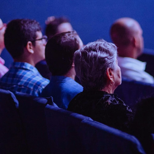 group of attendees listening to the CASDA make a presentation